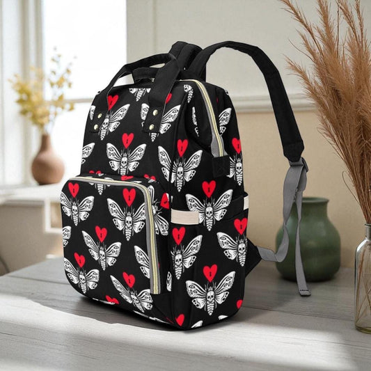 Gothic skull moth diaper backpack, red heart emo baby bag, creepy cute gift idea, witchy diaper tote for moms, spooky aesthetic mom backpack