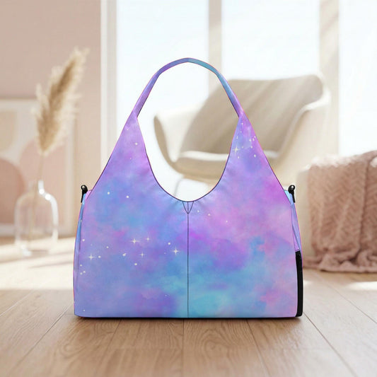 A vibrant purple handbag with a starry galaxy pattern is displayed on a wooden surface, with a white chair and a vase of flowers in the background.