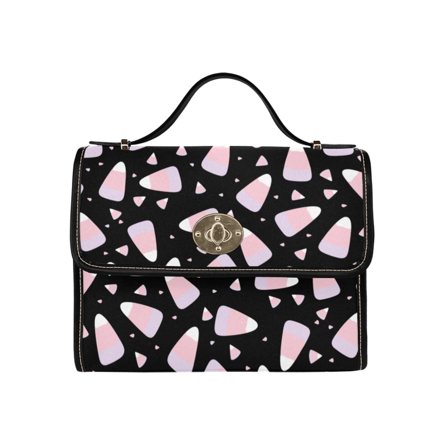 a black and pink handbag with hearts on it