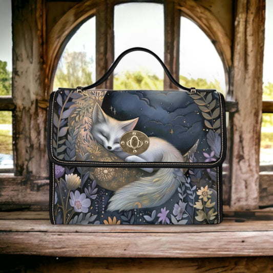 a purse with a picture of a fox on it