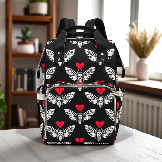Gothic skull moth diaper backpack, red heart emo baby bag, creepy cute gift idea, witchy diaper tote for moms, spooky aesthetic mom backpack