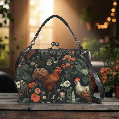 A handbag with a floral print design featuring roosters and flowers, placed on a wooden surface.