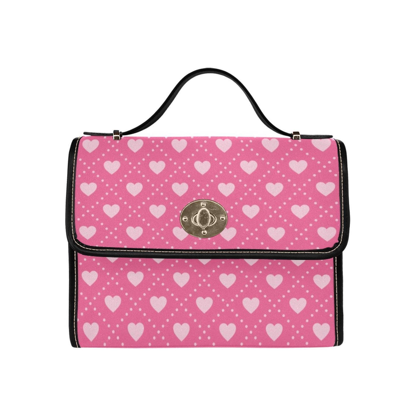 a pink and white purse with hearts on it