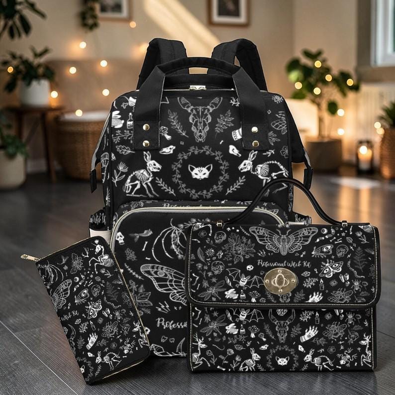 Goth moth-print backpack, handbag, and zip wallet shown together