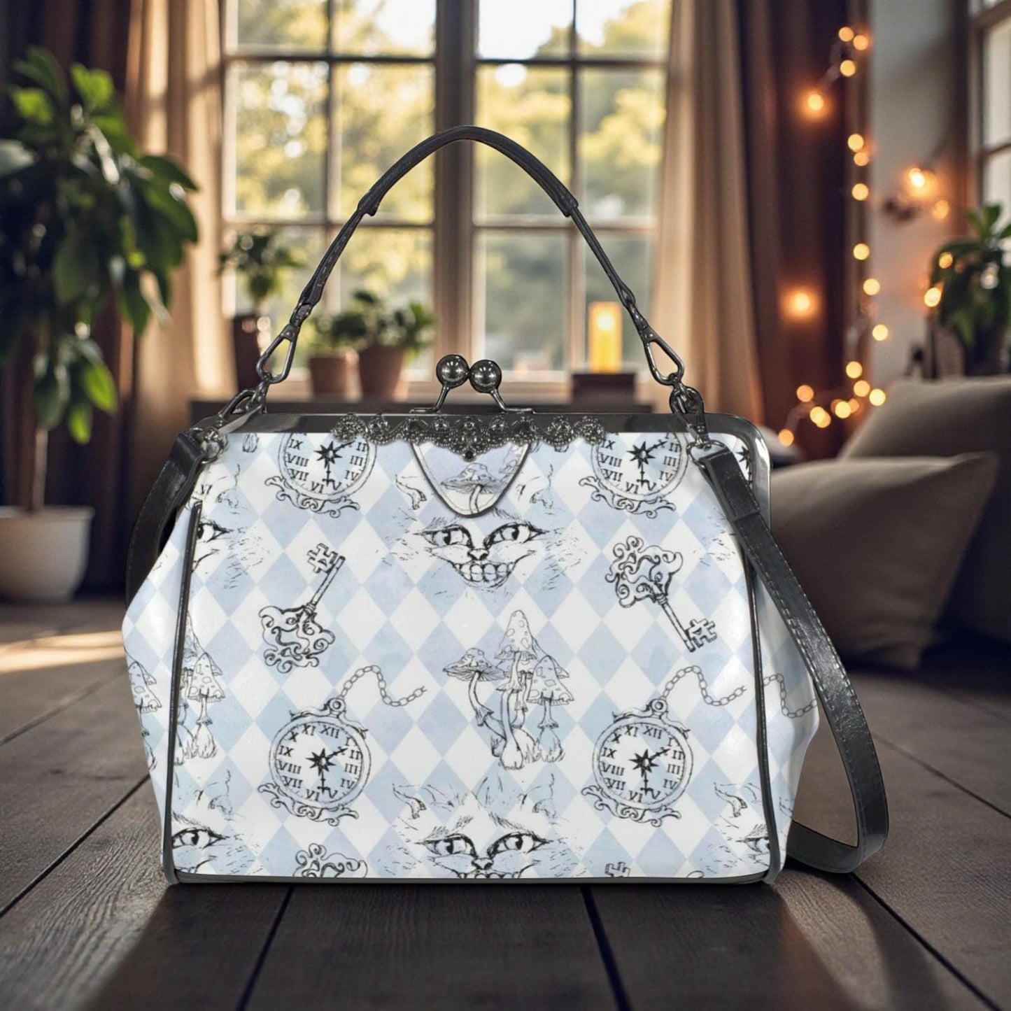 A handbag with a whimsical, cartoonish pattern of cats and clocks printed on it, placed on a wooden surface in front of a window with string lights.
