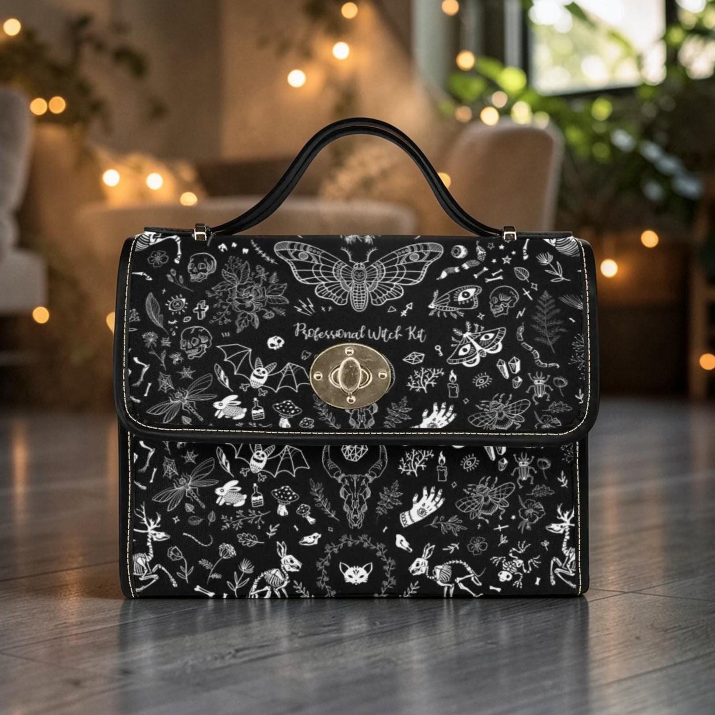 Goth moth-print handbag in a front view