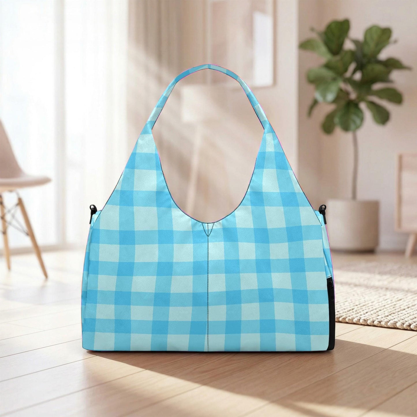A blue and white checkered handbag is placed on a wooden floor in a room with a potted plant in the background.