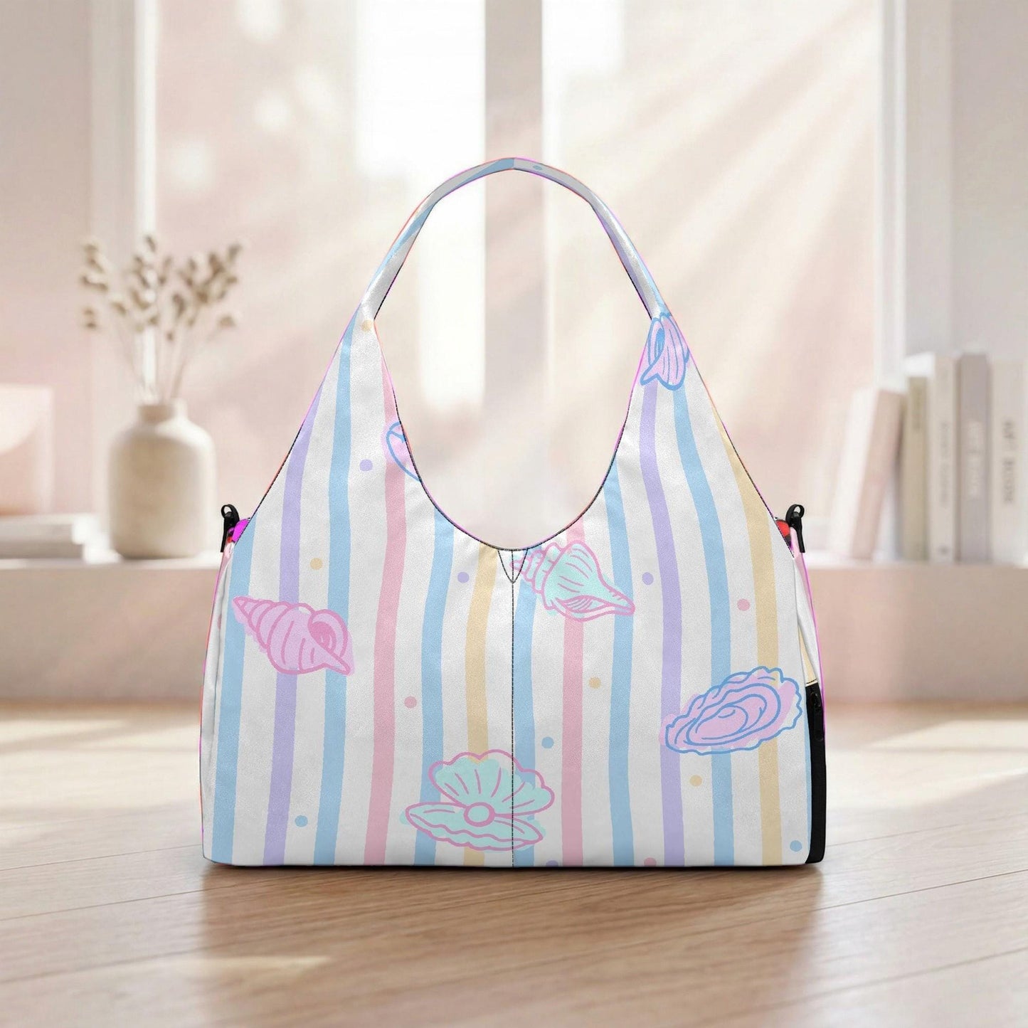 A colorful striped handbag with seashell and starfish designs is displayed on a wooden surface, with a window and bookshelf visible in the background.