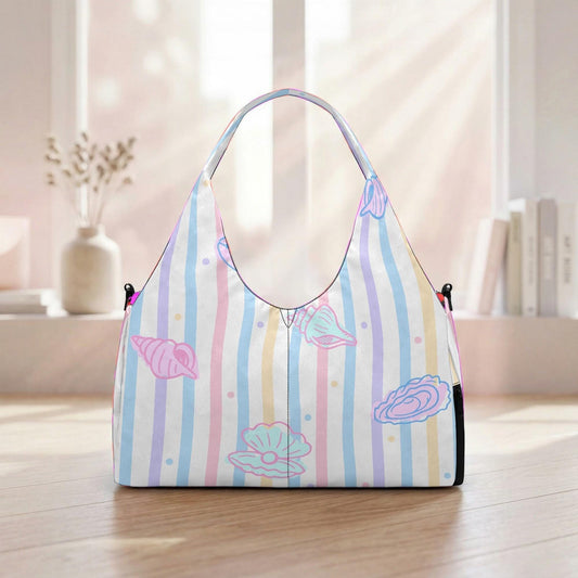 A colorful striped handbag with seashell and starfish designs is displayed on a wooden surface, with a window and bookshelf visible in the background.
