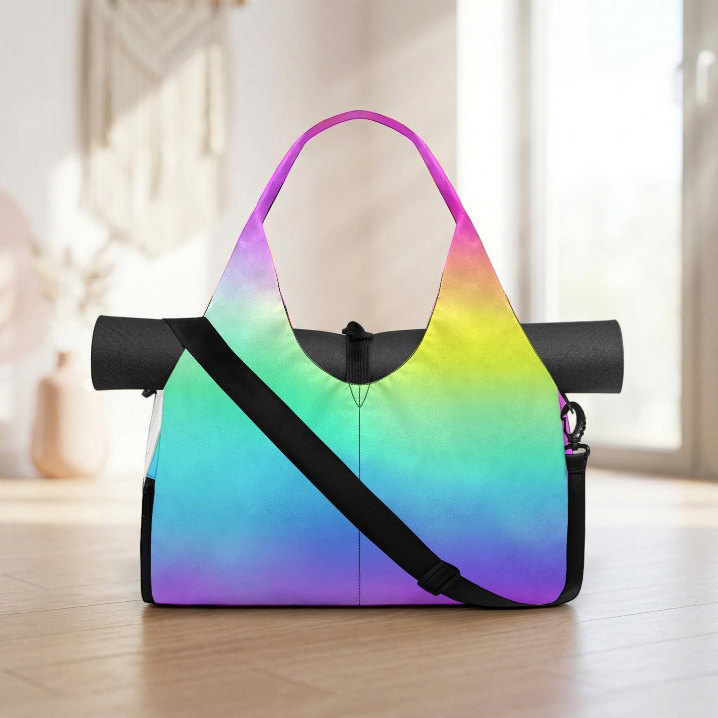 A colorful, rainbow-colored yoga bag with a black strap and handle is displayed on a wooden floor.