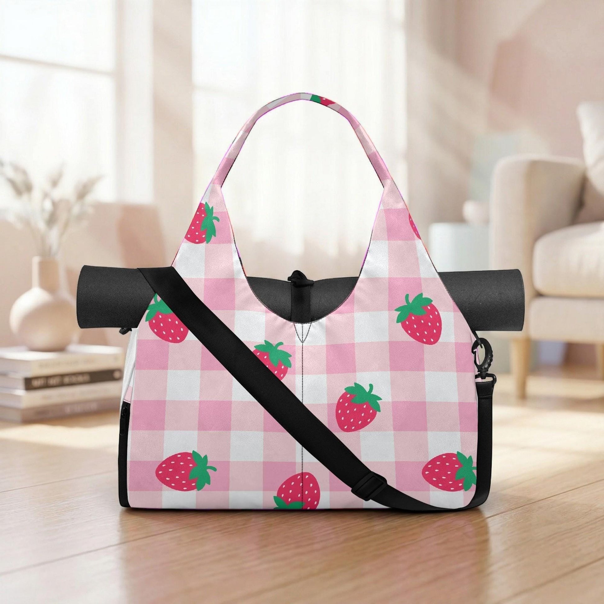 A pink and white checkered bag with a black strap and handle, featuring a pattern of red and green strawberries on a white background.