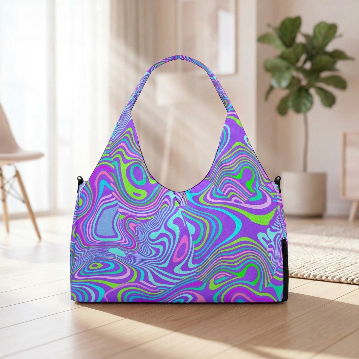 A colorful, patterned handbag with a vibrant, swirling design is displayed on a wooden floor in a room with a potted plant and a chair visible in the background.