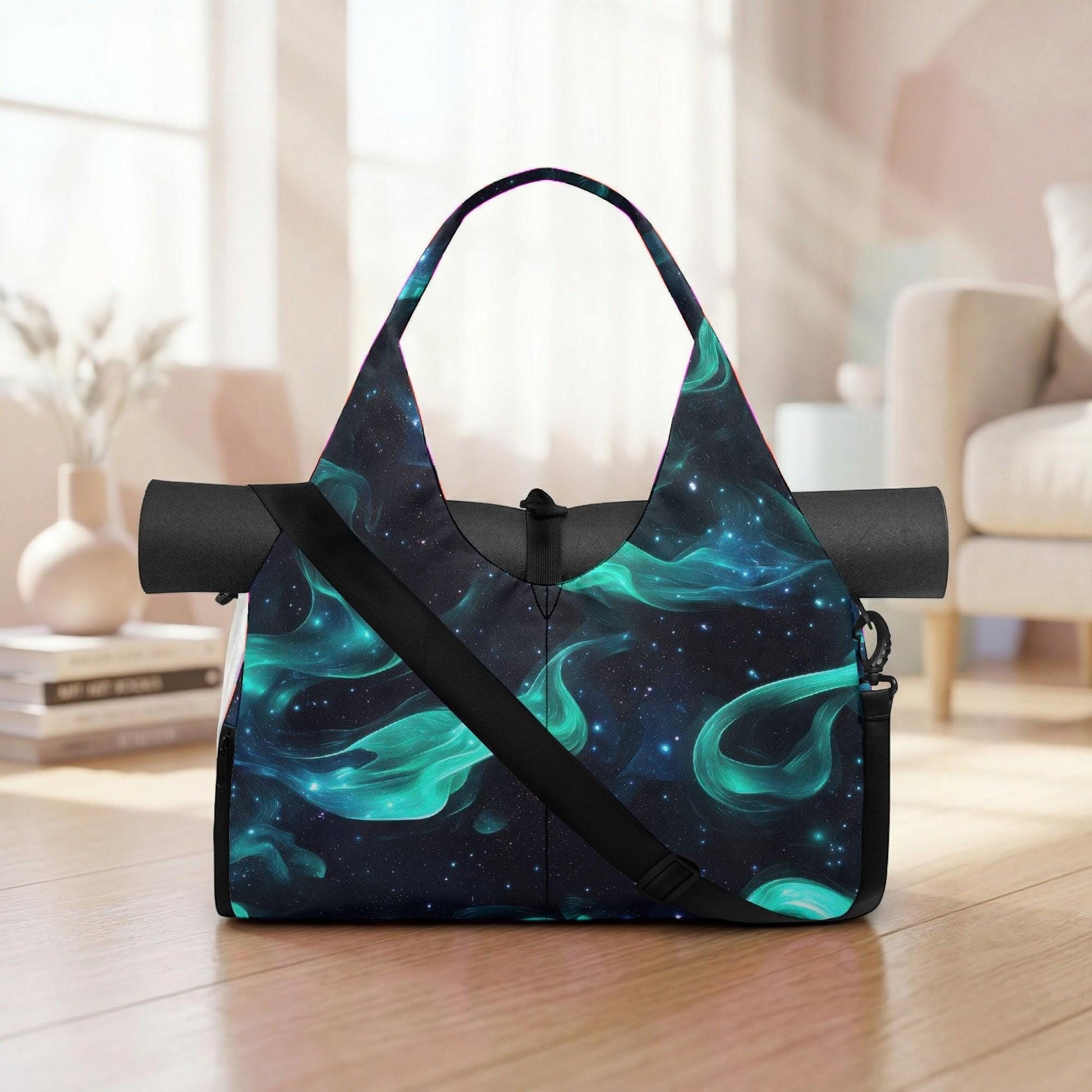 A black and blue yoga mat bag with a space-themed design, featuring swirling patterns and stars, is placed on a wooden floor in a room with a couch and bookshelf in the background.
