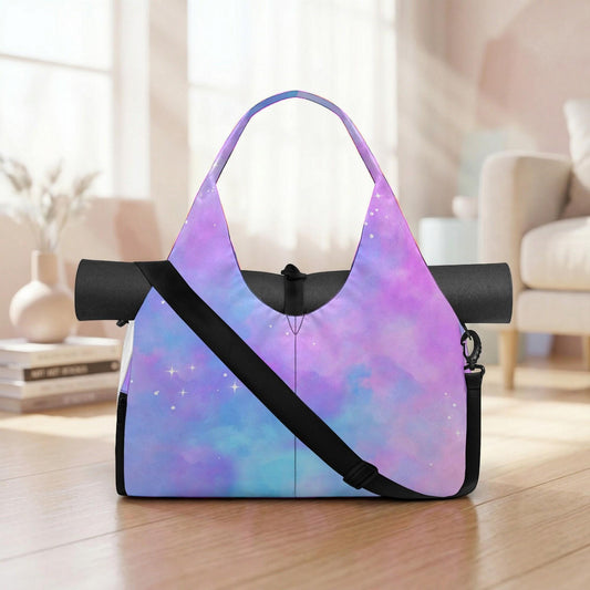 A colorful tote bag with a purple and blue galaxy-themed design, featuring a black strap and a black handle, is placed on a wooden floor in a room with a window and a white couch.