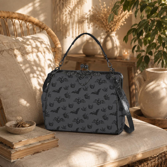Midnight bat flight handbag, eerie night creature purse, spooky clasp shoulder bag