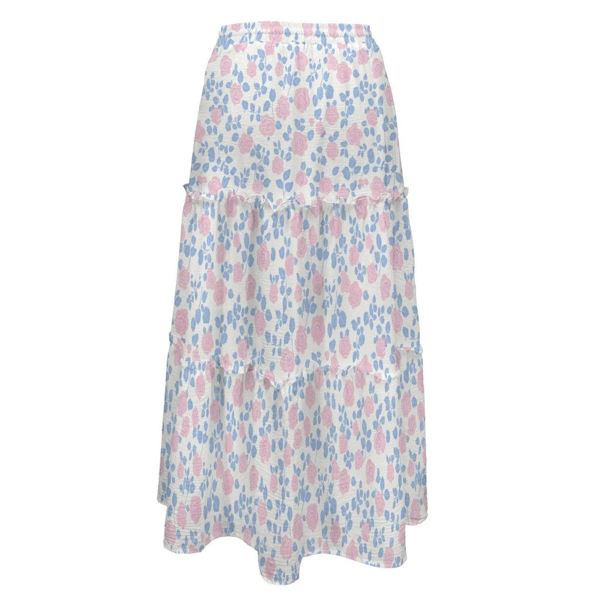 A long white tiered maxi skirt patterned with pink roses and blue leaves on an elastic waistband.