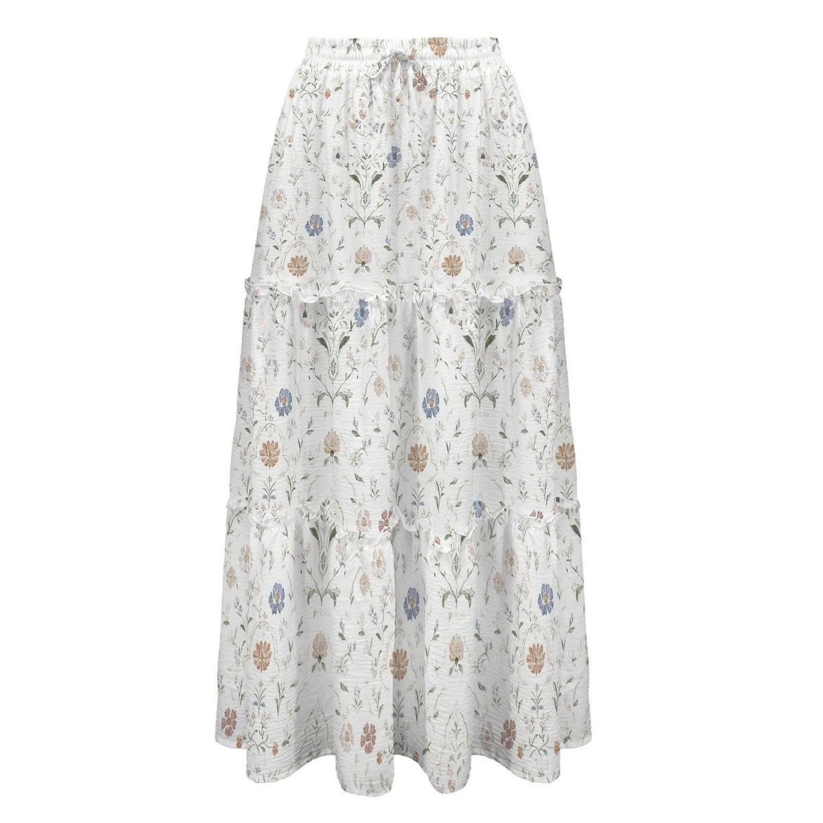Studio shot of a white tiered maxi skirt featuring a delicate multicolored floral botanical pattern against a white background.