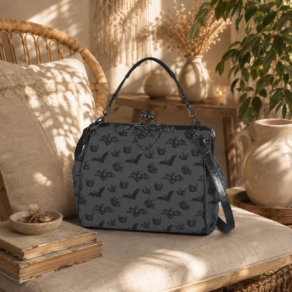 Midnight bat flight handbag, eerie night creature purse, spooky clasp shoulder bag