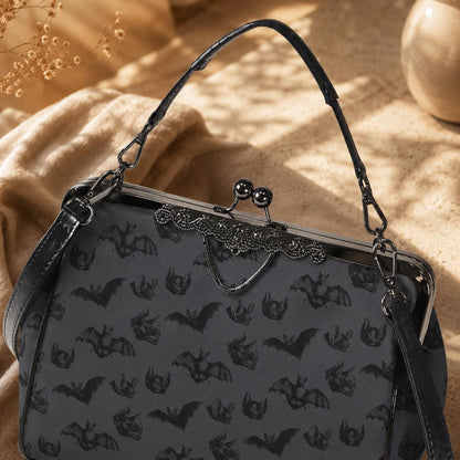 Midnight bat flight handbag, eerie night creature purse, spooky clasp shoulder bag
