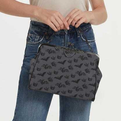 Midnight bat flight handbag, eerie night creature purse, spooky clasp shoulder bag