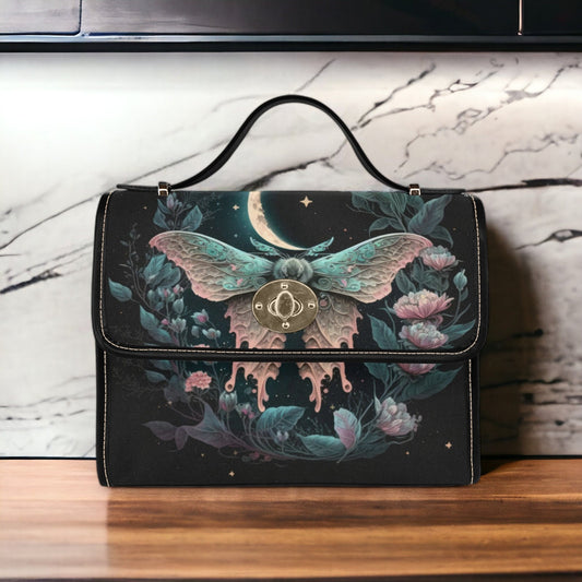 a handbag with a picture of a butterfly on it